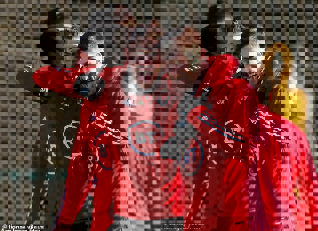 1451123