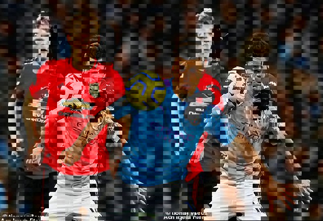1457993