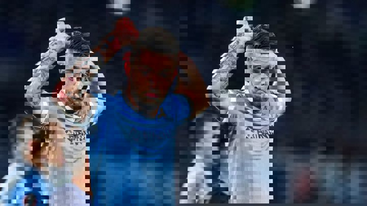 1695946