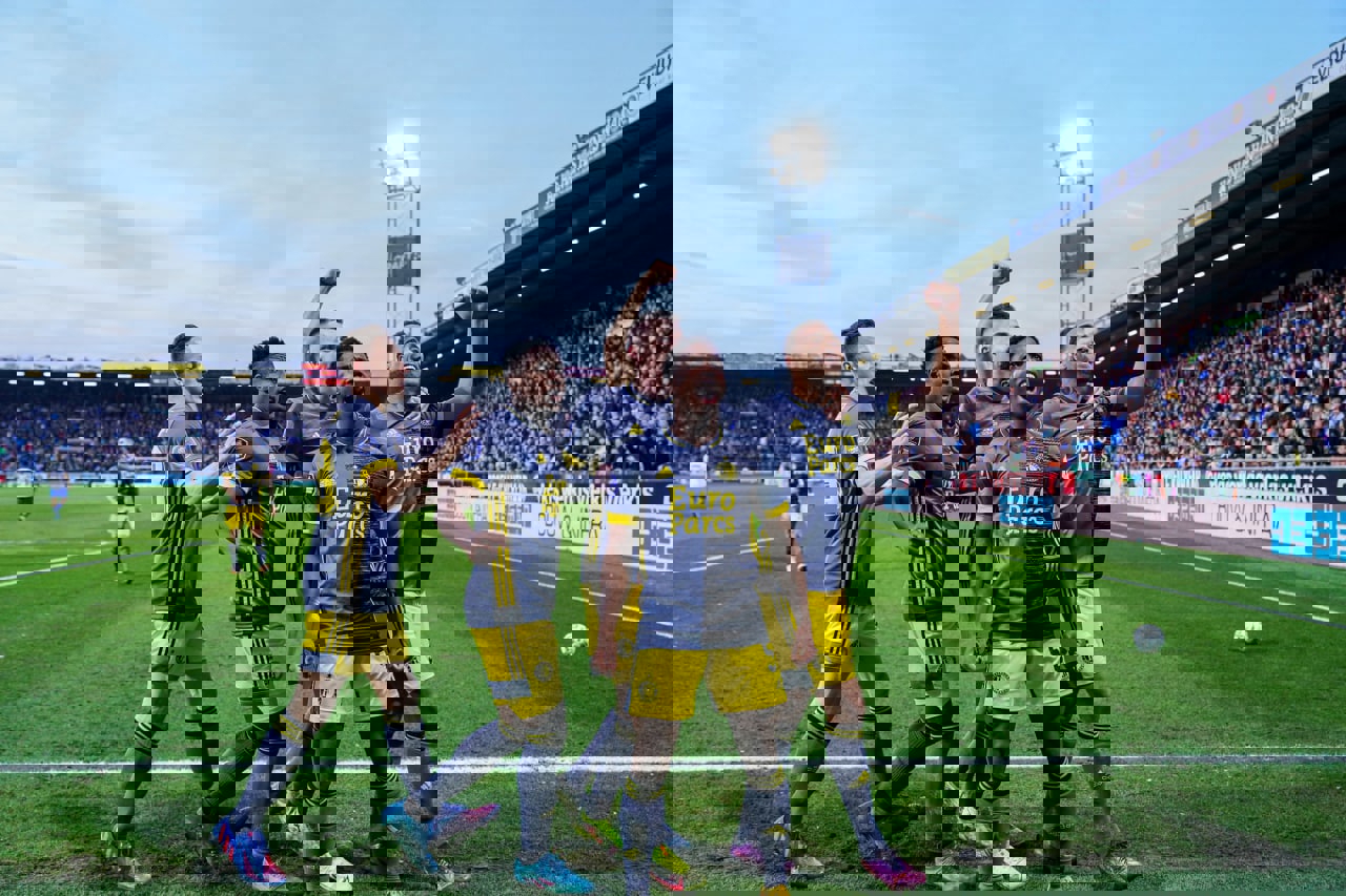1698440