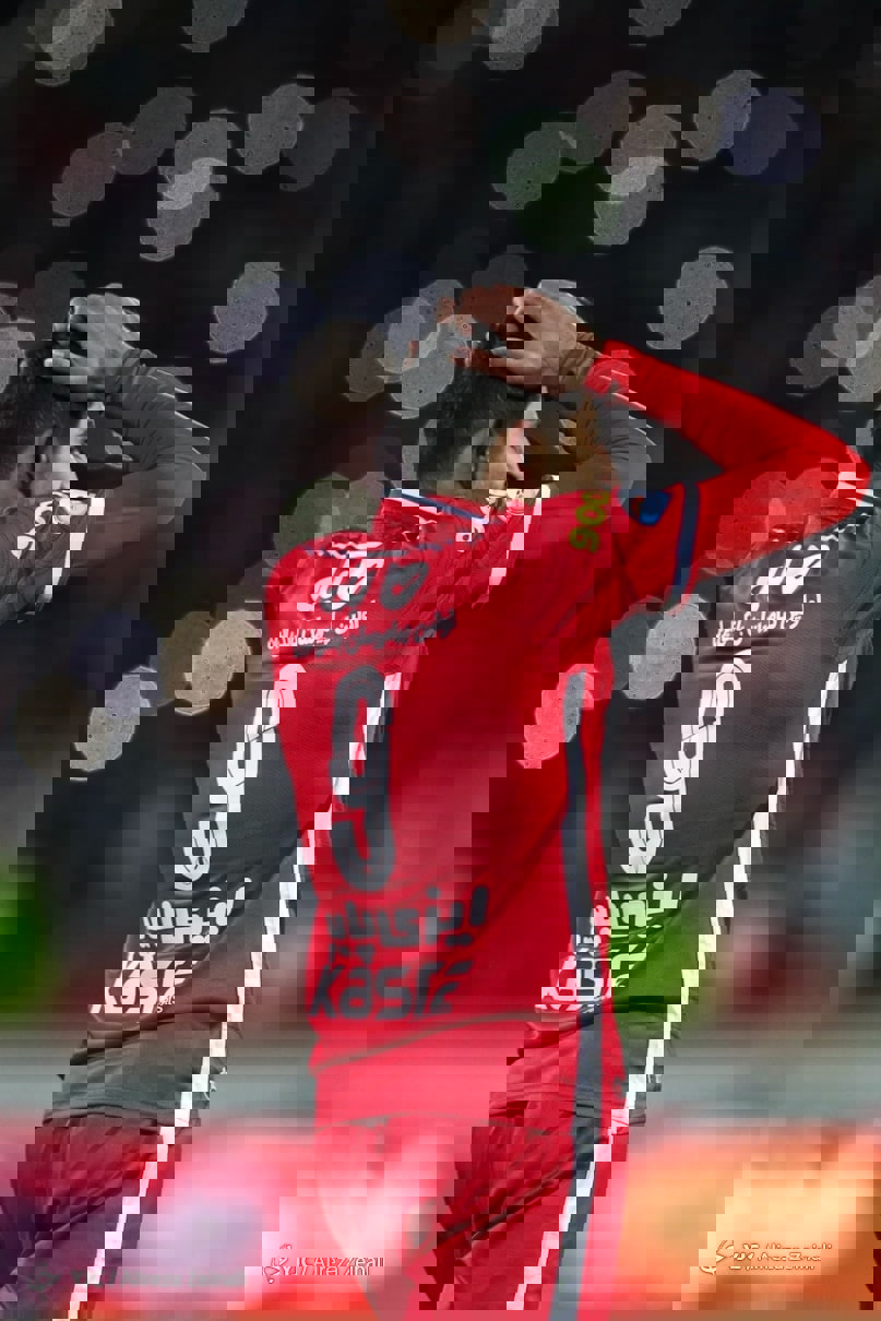 1699476