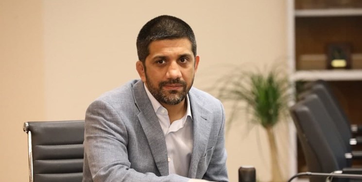 دبیر در فدراسیون وزنه برداری(عکس)