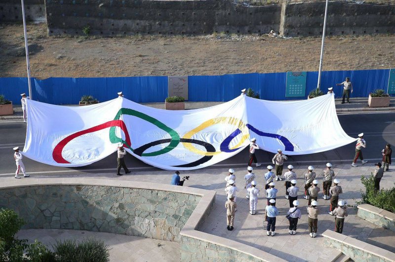 بزرگترين پرچم IOC روى دست المپين هاى ايران(عكس)