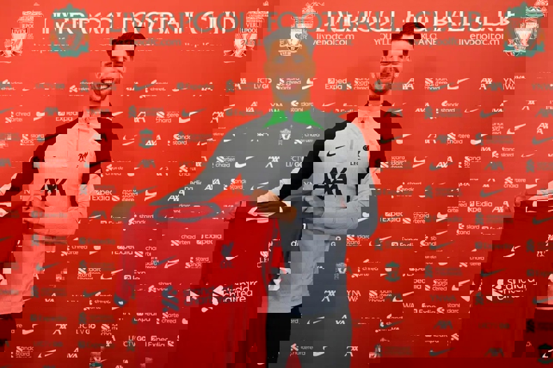 1893636