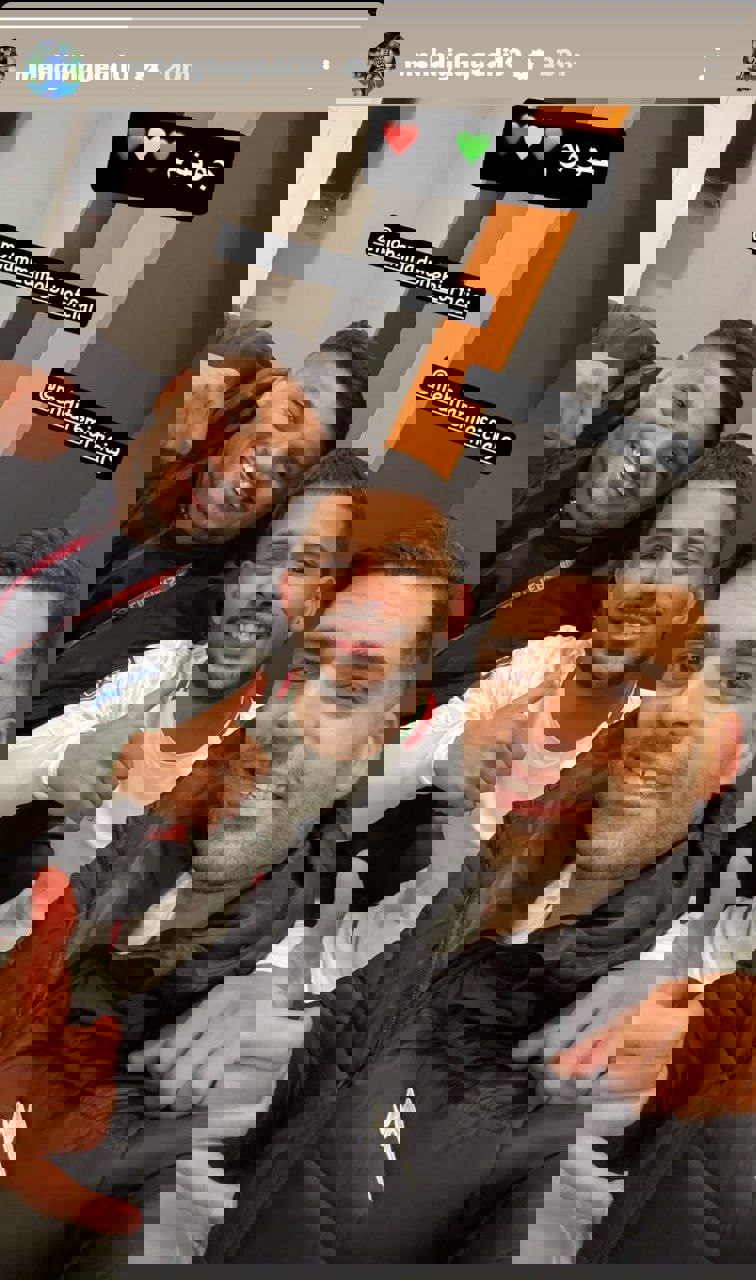 2165438