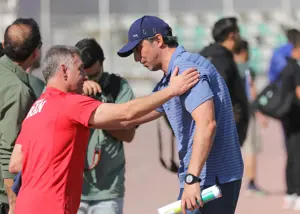 قهرمان کشتی در تمرین رقیب تراکتور (عکس)