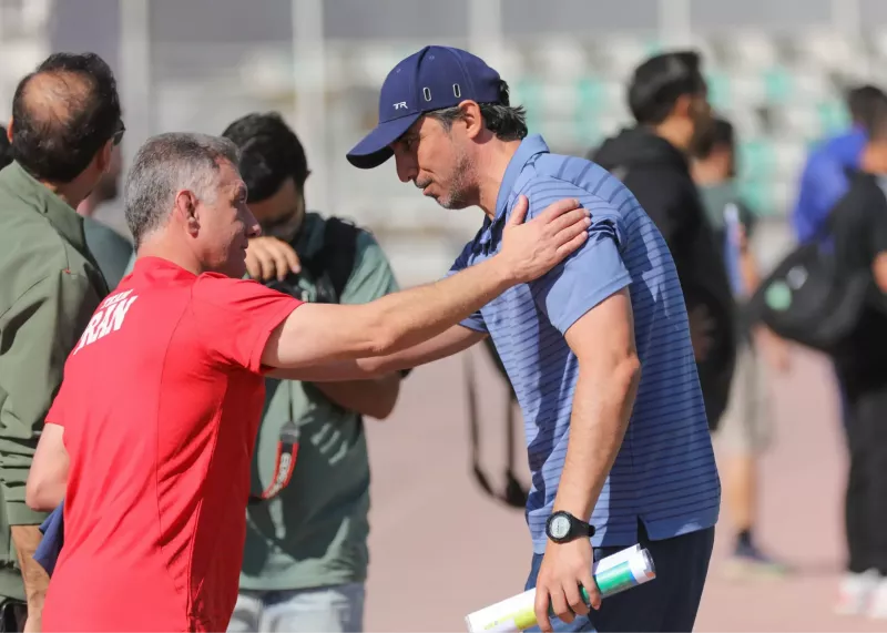 قهرمان کشتی در تمرین رقیب تراکتور (عکس)