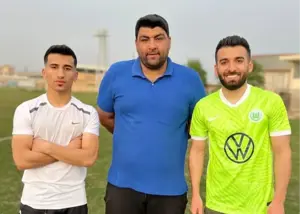 مربی گمنامی که دو بازیکن در تیم ملی دارد (عکس)