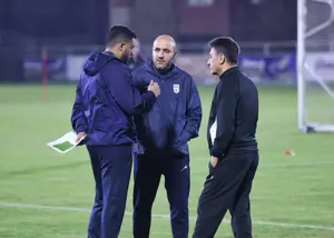 لبخند سرمربی تیم ملی به بلاتکلیفی چندین ساعته(عکس)