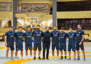 استقبال گرم از قهرمان المپیک در خانه کشتی(عکس)