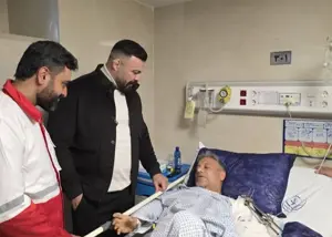 عیادت قهرمان جهان از مجروحان جنگ