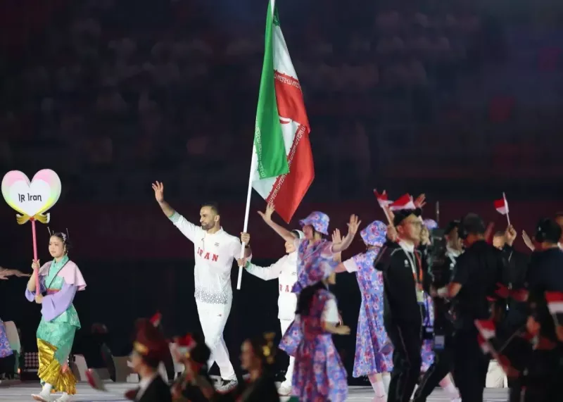 رژه کاروان ایران با لباس یکدست سفید(عکس)